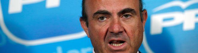 El ministro de Economía, Luis de Guindos, en la sede del PP donde acudió para reunirse con la cúpula económica del PP.