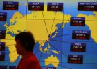 Día 1 del ‘plan Draghi’: el bono y el euro rozan mínimos Día 1 del ‘plan Draghi’: el bono y el euro rozan mínimos