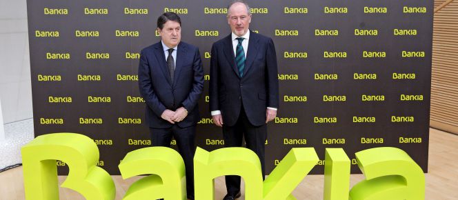 José Luis Olivas (izquierda), junto a Rodrigo Rato en junio de 2011.