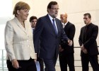 Merkel respalda sin fisuras la política económica de Rajoy Merkel respalda sin fisuras la política económica de Rajoy