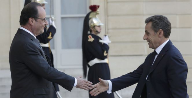 El presidente francés, Francois Hollande, junto al líder de la oposición, Nicolas Sarkozy.