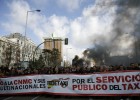 Los taxistas se manifiestan en Madrid contra la CNMC y Uber Los taxistas se manifiestan en Madrid contra la CNMC y Uber