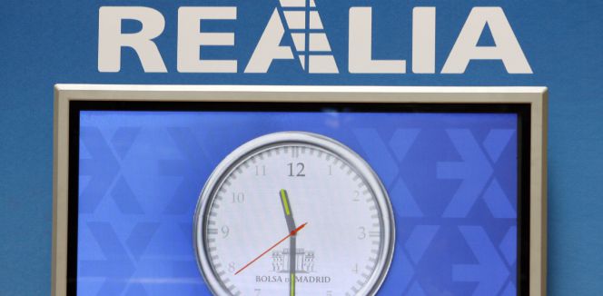 Detalle del reloj de la Bolsa de Madrid, durante el debut en bolsa de Realia.