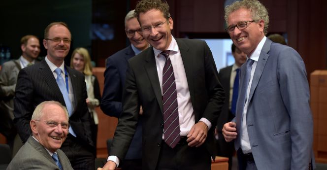 Wolfgang Schauble, con el presidente del Eurogrupo, Jeroen Dijsselbloem y el ministro de Finanzas luxemburgués, Pierre Gramegna.
