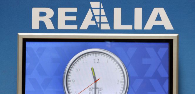 Detalle del reloj de la Bolsa de Madrid, durante el debut en bolsa de Realia.