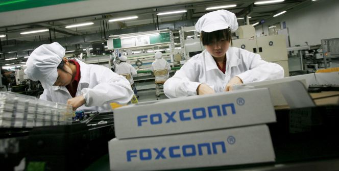 Trabajadores de una fábrica de Foxconn en la localidad china de Longhua.