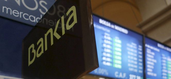 Paneles informativos en la Bolsa de Madrid que muestran la cotización de los principales valores del IBEX 35. EFEArchivo