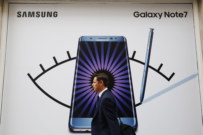 A man walks past an advertisement for the Samsung Galaxy Note 7 in London, Britain, September 2, 2016. REUTERSLuke MacGregorFile Photo
