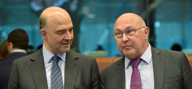 El comisario europeo de Asuntos Económicos, Pierre Moscovici, y el ministro francés de Finanzas, Michel Sapin.