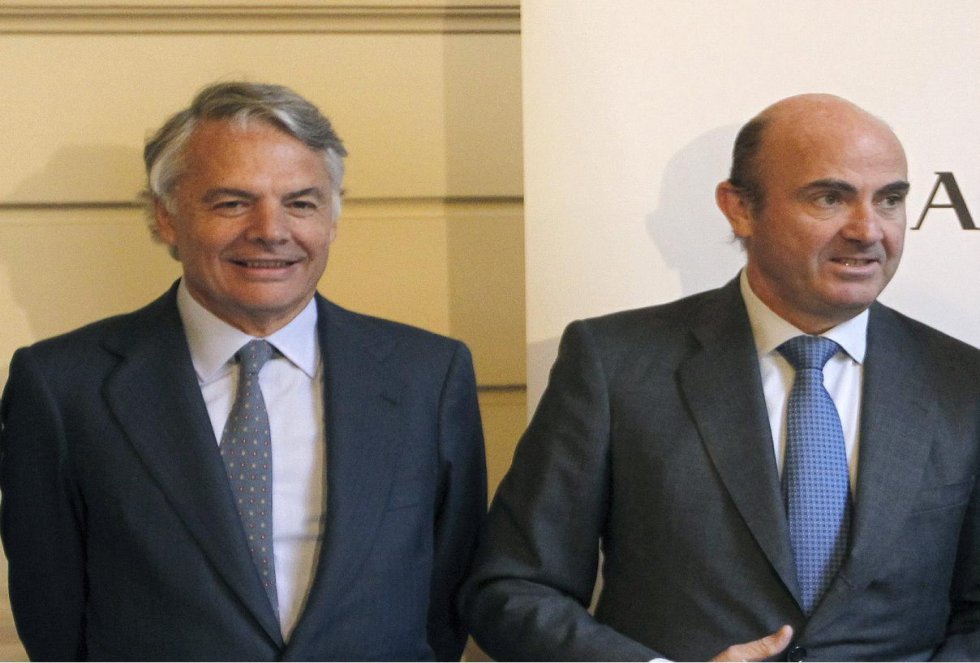 Ignacio Garralda, presidente de Mutua Madrileña, junto con Luis de Guindos, ministro de Economía.