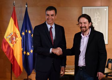 (FILES) In this file photo taken on July 09, 2019 Spanish Prime Minister Pedro Sanchez (L) shakes hands with Podemos party leader Pablo Iglesias upon his arrival for a meeting at Las Cortes in Madrid on July 9, 2019. - Spain's new parliament will vote on whether to grant socialist leader Pedro Sanchez a second term as prime minister on July 23. To be sworn in again as prime minister Sanchez will need the support of far-left Podemos -- which has 42 seats -- and several other smaller, regional parties. (Photo by PIERRE-PHILIPPE MARCOU AFP)