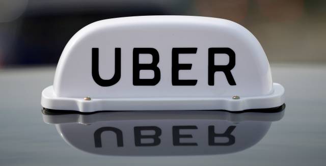 Un cartel promocional de Uber.