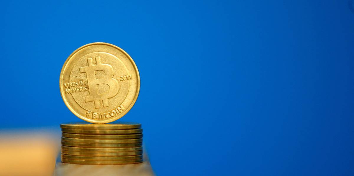 Ilustración de una moneda virtual de bitcóinl.