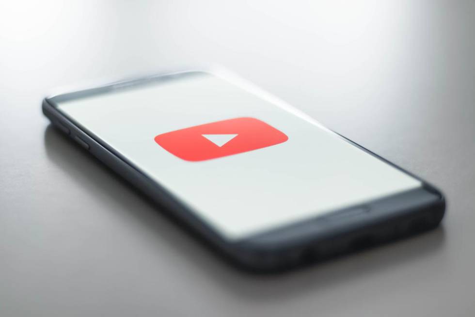 YouTube logo on smartphone