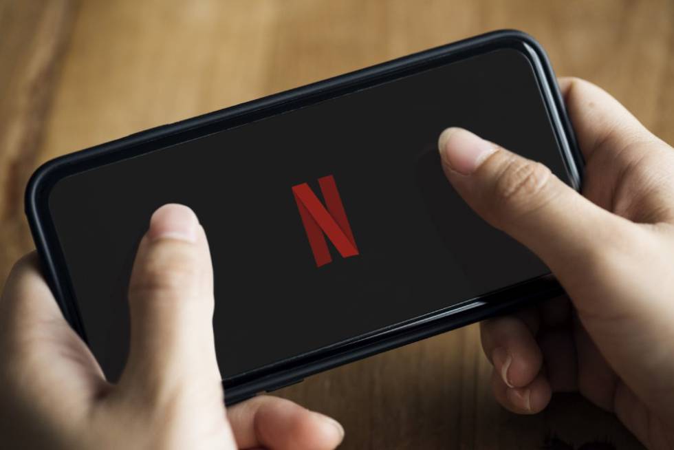 Phone with Netflix logo on screen