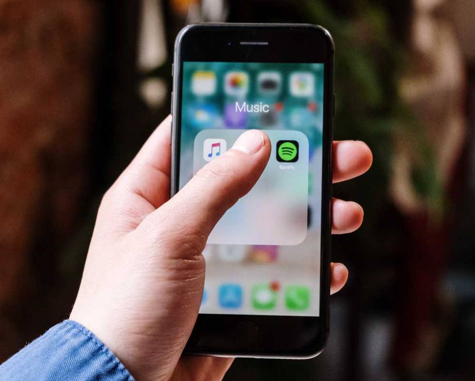 iPhone with Spotify app