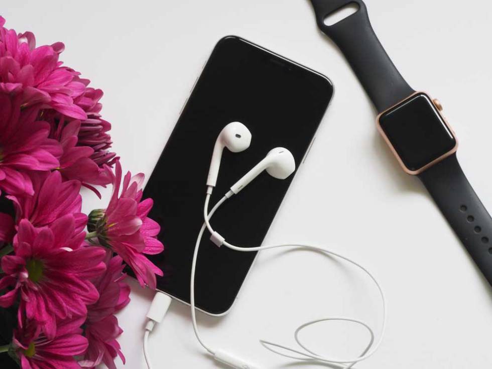 An Apple Watch alongside an iPhone