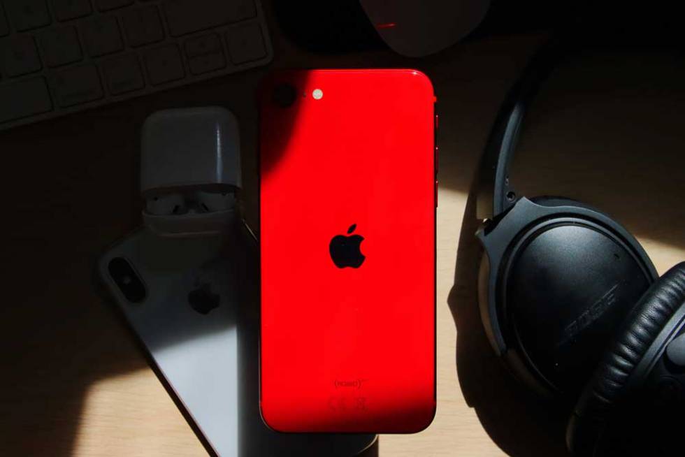 The back of a red iPhone SE
