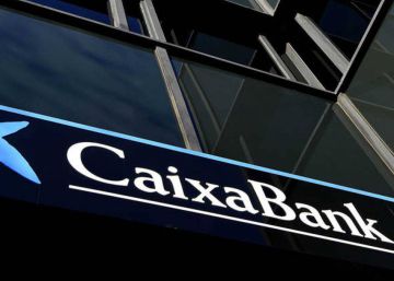 Caixabank gana 3.145 millones en 2022, un 39,8% menos por el efecto de la fusión, y pagará el 55% en dividendos